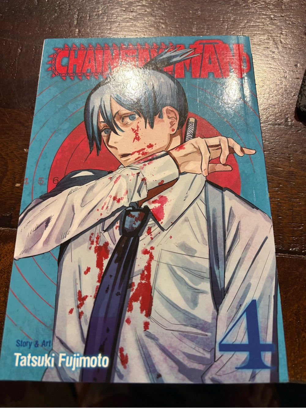 Chainsaw Man Vol. 4 by Tatsuki Fujimoto